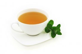Una taza con té verde